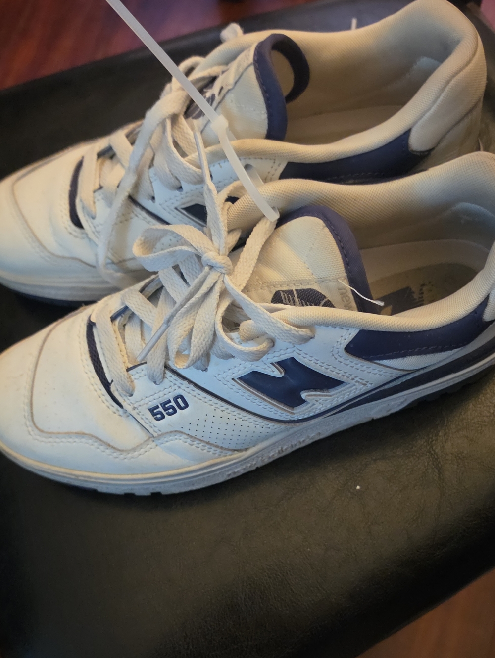 New Balance 550 Sneakers in White and Navy
